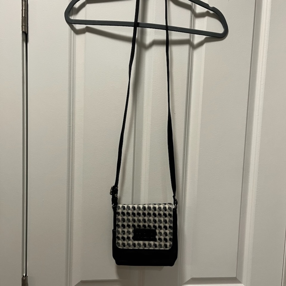 Mala leather and wool crossbody bag